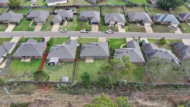 Discover this inviting 3-bedroom, 2-bathroom split-plan home in on Patrick Farms Golf Club in Mississippi - for sale on GolfHomes.com, golf home, golf lot