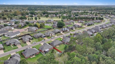 Discover this inviting 3-bedroom, 2-bathroom split-plan home in on Patrick Farms Golf Club in Mississippi - for sale on GolfHomes.com, golf home, golf lot