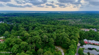 Looking for a coastal haven in North Carolina, brimming with on The Lakes Country Club in North Carolina - for sale on GolfHomes.com, golf home, golf lot