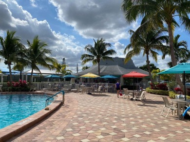 Step into this beautifully furnished 1-bedroom, 1.5-bathroom on Hillsboro Pines Golf in Florida - for sale on GolfHomes.com, golf home, golf lot
