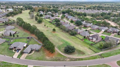 Discover this inviting 3-bedroom, 2-bathroom split-plan home in on Patrick Farms Golf Club in Mississippi - for sale on GolfHomes.com, golf home, golf lot