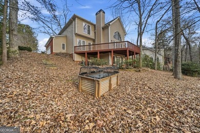 Welcome to this gorgeous traditional home perfectly situated on on Canongate At Eagle Watch Golf Club in Georgia - for sale on GolfHomes.com, golf home, golf lot