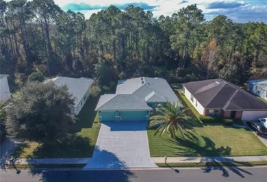 Room For The Cars,Tools,And Everything In Between! This on St. Johns Golf Club in Florida - for sale on GolfHomes.com, golf home, golf lot