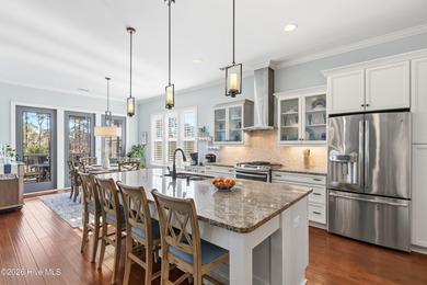 Experience sweeping golf course vistas, refined interior spaces on Rivers Edge Golf Club in North Carolina - for sale on GolfHomes.com, golf home, golf lot