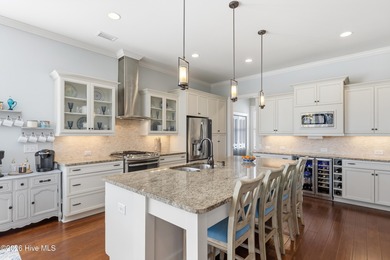 Experience sweeping golf course vistas, refined interior spaces on Rivers Edge Golf Club in North Carolina - for sale on GolfHomes.com, golf home, golf lot