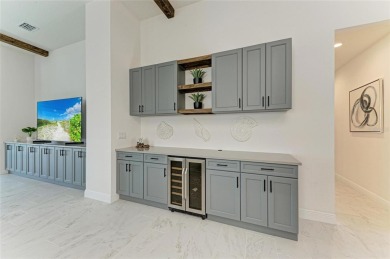 Come home to easy living, casual elegance, and soothing views on IMG Academies Golf and Country Club in Florida - for sale on GolfHomes.com, golf home, golf lot