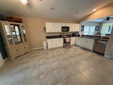 Room For The Cars,Tools,And Everything In Between! This on St. Johns Golf Club in Florida - for sale on GolfHomes.com, golf home, golf lot