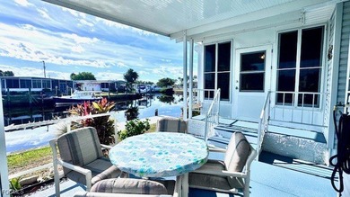 Welcome to your dream waterfront home in the premier 55+ gated on Riverbend Golf and Country Club in Florida - for sale on GolfHomes.com, golf home, golf lot