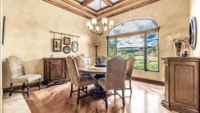 Set high above the 9th hole in Redlands Mesa, 324 Iron Horse Ct on The Golf Club At Redlands Mesa in Colorado - for sale on GolfHomes.com, golf home, golf lot