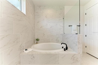 Come home to easy living, casual elegance, and soothing views on IMG Academies Golf and Country Club in Florida - for sale on GolfHomes.com, golf home, golf lot