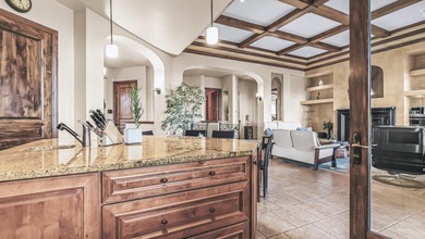 Set high above the 9th hole in Redlands Mesa, 324 Iron Horse Ct on The Golf Club At Redlands Mesa in Colorado - for sale on GolfHomes.com, golf home, golf lot