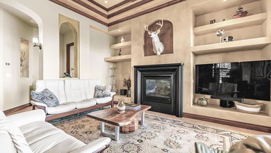 Set high above the 9th hole in Redlands Mesa, 324 Iron Horse Ct on The Golf Club At Redlands Mesa in Colorado - for sale on GolfHomes.com, golf home, golf lot