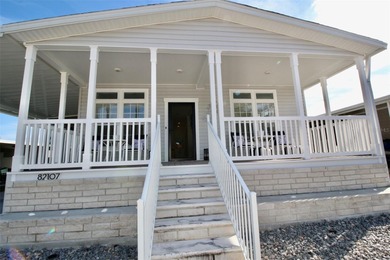 **GOLDEN GATE'S TAJ MAHAL** Magnificent 2 bedroom, 2 full bath on Mainlands Golf Club in Florida - for sale on GolfHomes.com, golf home, golf lot