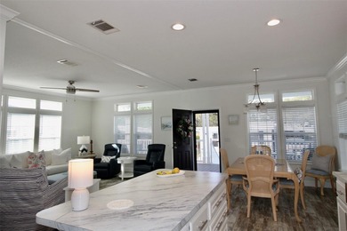 **GOLDEN GATE'S TAJ MAHAL** Magnificent 2 bedroom, 2 full bath on Mainlands Golf Club in Florida - for sale on GolfHomes.com, golf home, golf lot