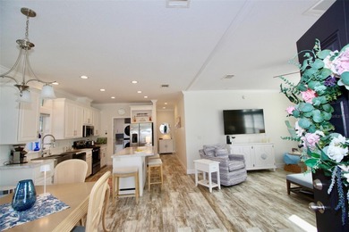 **GOLDEN GATE'S TAJ MAHAL** Magnificent 2 bedroom, 2 full bath on Mainlands Golf Club in Florida - for sale on GolfHomes.com, golf home, golf lot