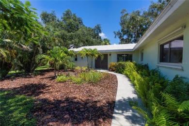 Beautifully Updated GOLF COURSE Frontage Home with the ABSOLUTE on Village Green Golf Club of Sarasota in Florida - for sale on GolfHomes.com, golf home, golf lot