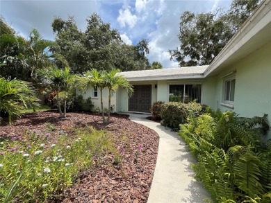 Beautifully Updated GOLF COURSE Frontage Home with the ABSOLUTE on Village Green Golf Club of Sarasota in Florida - for sale on GolfHomes.com, golf home, golf lot