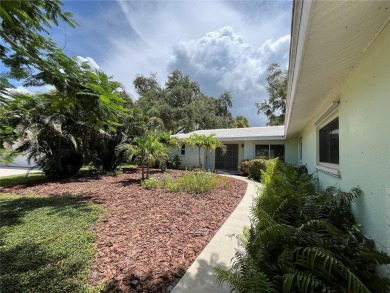 Beautifully Updated GOLF COURSE Frontage Home with the ABSOLUTE on Village Green Golf Club of Sarasota in Florida - for sale on GolfHomes.com, golf home, golf lot