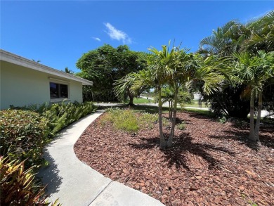 Beautifully Updated GOLF COURSE Frontage Home with the ABSOLUTE on Village Green Golf Club of Sarasota in Florida - for sale on GolfHomes.com, golf home, golf lot