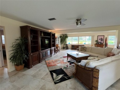 Beautifully Updated GOLF COURSE Frontage Home with the ABSOLUTE on Village Green Golf Club of Sarasota in Florida - for sale on GolfHomes.com, golf home, golf lot