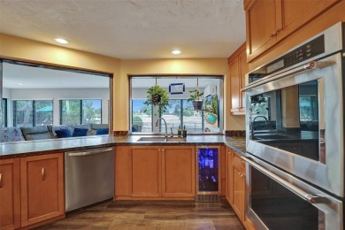 Unforgettable 5-bed, 3-bath gem at the end of a quiet cul-de-sac on Jacaranda Golf Club in Florida - for sale on GolfHomes.com, golf home, golf lot