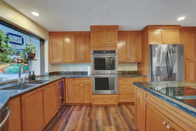 Unforgettable 5-bed, 3-bath gem at the end of a quiet cul-de-sac on Jacaranda Golf Club in Florida - for sale on GolfHomes.com, golf home, golf lot