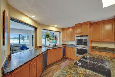 Unforgettable 5-bed, 3-bath gem at the end of a quiet cul-de-sac on Jacaranda Golf Club in Florida - for sale on GolfHomes.com, golf home, golf lot