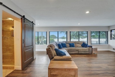 Unforgettable 5-bed, 3-bath gem at the end of a quiet cul-de-sac on Jacaranda Golf Club in Florida - for sale on GolfHomes.com, golf home, golf lot