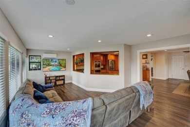 Unforgettable 5-bed, 3-bath gem at the end of a quiet cul-de-sac on Jacaranda Golf Club in Florida - for sale on GolfHomes.com, golf home, golf lot