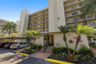 STUNNING CONDO IN COVE CAY! Welcome to this charming 2-bedroom on Cove Cay Country Club in Florida - for sale on GolfHomes.com, golf home, golf lot