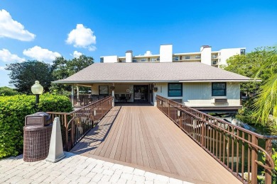 STUNNING CONDO IN COVE CAY! Welcome to this charming 2-bedroom on Cove Cay Country Club in Florida - for sale on GolfHomes.com, golf home, golf lot