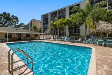 STUNNING CONDO IN COVE CAY! Welcome to this charming 2-bedroom on Cove Cay Country Club in Florida - for sale on GolfHomes.com, golf home, golf lot