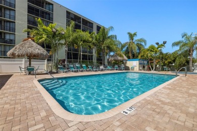 STUNNING CONDO IN COVE CAY! Welcome to this charming 2-bedroom on Cove Cay Country Club in Florida - for sale on GolfHomes.com, golf home, golf lot