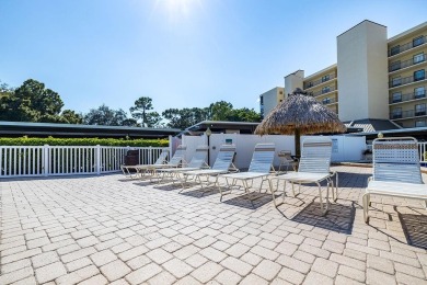 STUNNING CONDO IN COVE CAY! Welcome to this charming 2-bedroom on Cove Cay Country Club in Florida - for sale on GolfHomes.com, golf home, golf lot