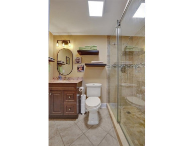 Unforgettable 5-bed, 3-bath gem at the end of a quiet cul-de-sac on Jacaranda Golf Club in Florida - for sale on GolfHomes.com, golf home, golf lot