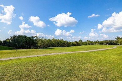 STUNNING CONDO IN COVE CAY! Welcome to this charming 2-bedroom on Cove Cay Country Club in Florida - for sale on GolfHomes.com, golf home, golf lot