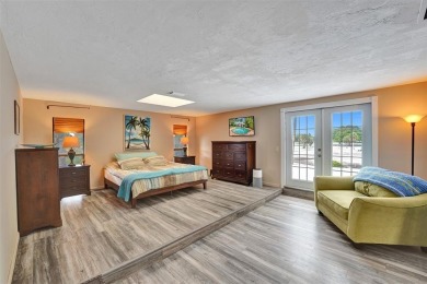 Unforgettable 5-bed, 3-bath gem at the end of a quiet cul-de-sac on Jacaranda Golf Club in Florida - for sale on GolfHomes.com, golf home, golf lot