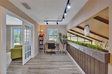 Unforgettable 5-bed, 3-bath gem at the end of a quiet cul-de-sac on Jacaranda Golf Club in Florida - for sale on GolfHomes.com, golf home, golf lot