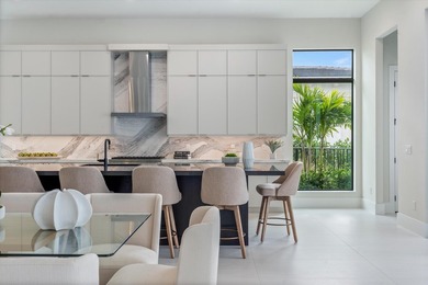 Set on an estate lot within Avenir's most luxurious gated on Palm Beach Gardens Golf Course in Florida - for sale on GolfHomes.com, golf home, golf lot