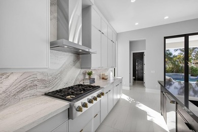 Set on an estate lot within Avenir's most luxurious gated on Palm Beach Gardens Golf Course in Florida - for sale on GolfHomes.com, golf home, golf lot