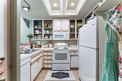 Welcome to this exquisite two-bedroom upstairs, end-unit in the on Tustin Ranch Golf Club in California - for sale on GolfHomes.com, golf home, golf lot