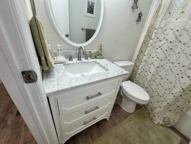 A beautiful remodeled home done in 2022! As you arrive at the on Del Tura Golf and Country Club in Florida - for sale on GolfHomes.com, golf home, golf lot