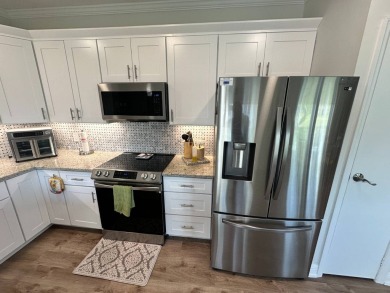 A beautiful remodeled home done in 2022! As you arrive at the on Del Tura Golf and Country Club in Florida - for sale on GolfHomes.com, golf home, golf lot