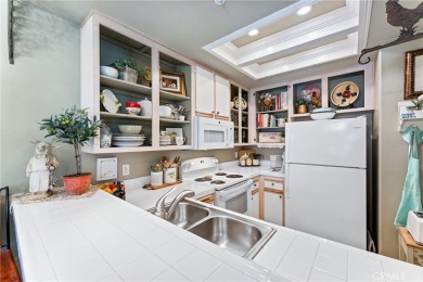 Welcome to this exquisite two-bedroom upstairs, end-unit in the on Tustin Ranch Golf Club in California - for sale on GolfHomes.com, golf home, golf lot