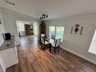 A beautiful remodeled home done in 2022! As you arrive at the on Del Tura Golf and Country Club in Florida - for sale on GolfHomes.com, golf home, golf lot