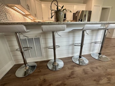 A beautiful remodeled home done in 2022! As you arrive at the on Del Tura Golf and Country Club in Florida - for sale on GolfHomes.com, golf home, golf lot