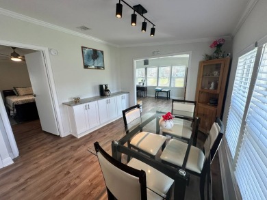 A beautiful remodeled home done in 2022! As you arrive at the on Del Tura Golf and Country Club in Florida - for sale on GolfHomes.com, golf home, golf lot
