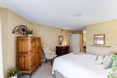 Welcome to this exquisite two-bedroom upstairs, end-unit in the on Tustin Ranch Golf Club in California - for sale on GolfHomes.com, golf home, golf lot