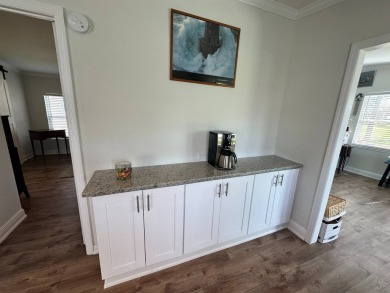 A beautiful remodeled home done in 2022! As you arrive at the on Del Tura Golf and Country Club in Florida - for sale on GolfHomes.com, golf home, golf lot