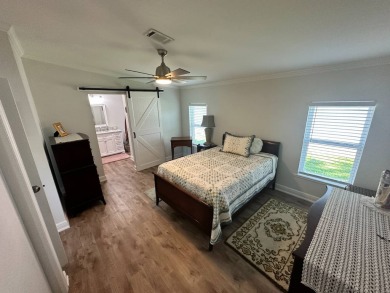 A beautiful remodeled home done in 2022! As you arrive at the on Del Tura Golf and Country Club in Florida - for sale on GolfHomes.com, golf home, golf lot